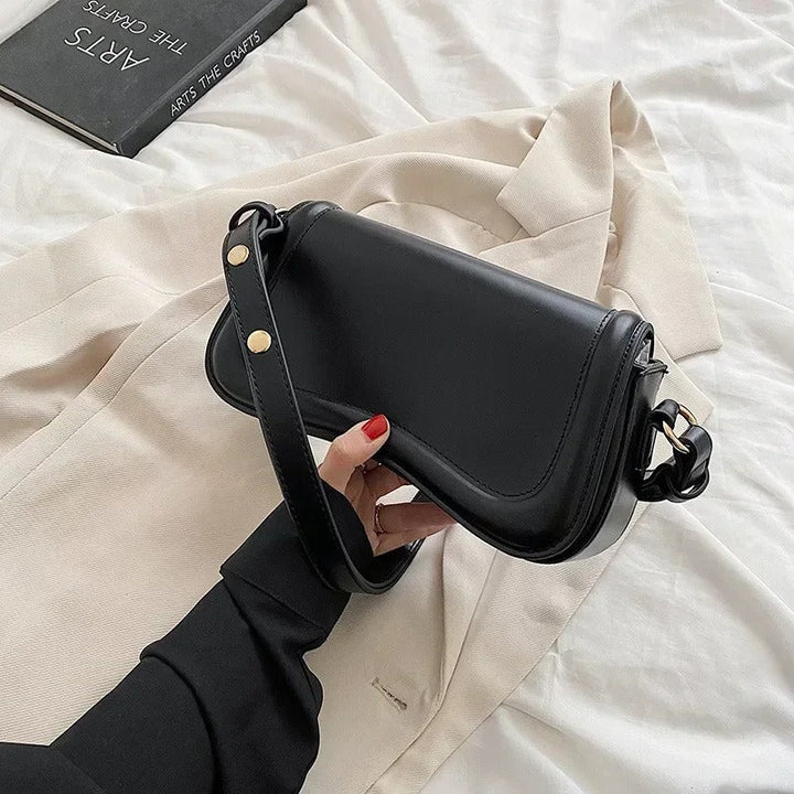 Cadence | Borsa in pelle vegana con patta ondulata